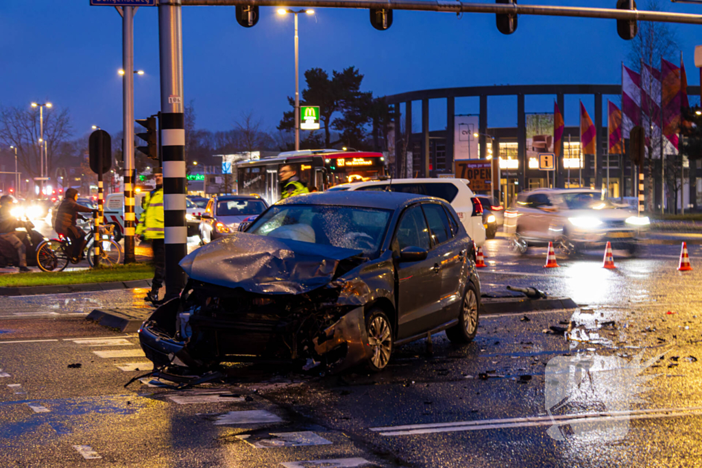 Forse schade na ongeval met politieauto