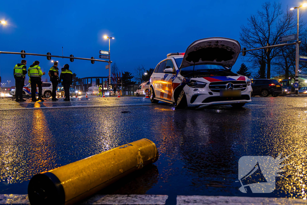 Forse schade na ongeval met politieauto