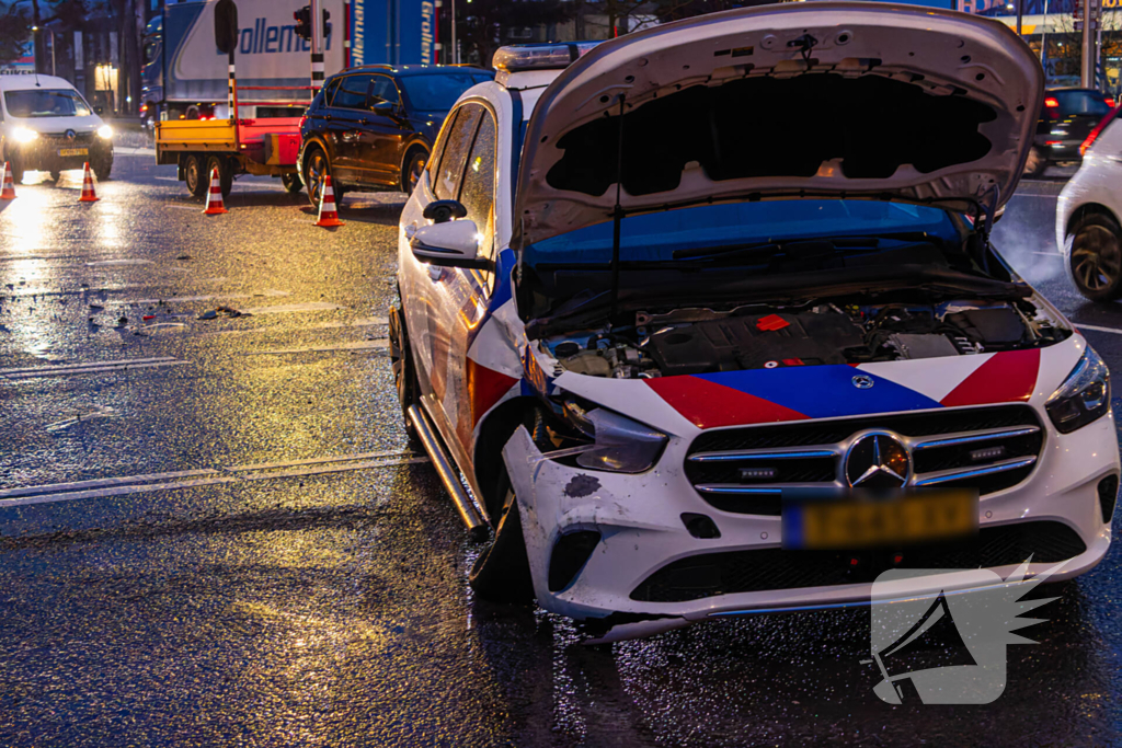 Forse schade na ongeval met politieauto
