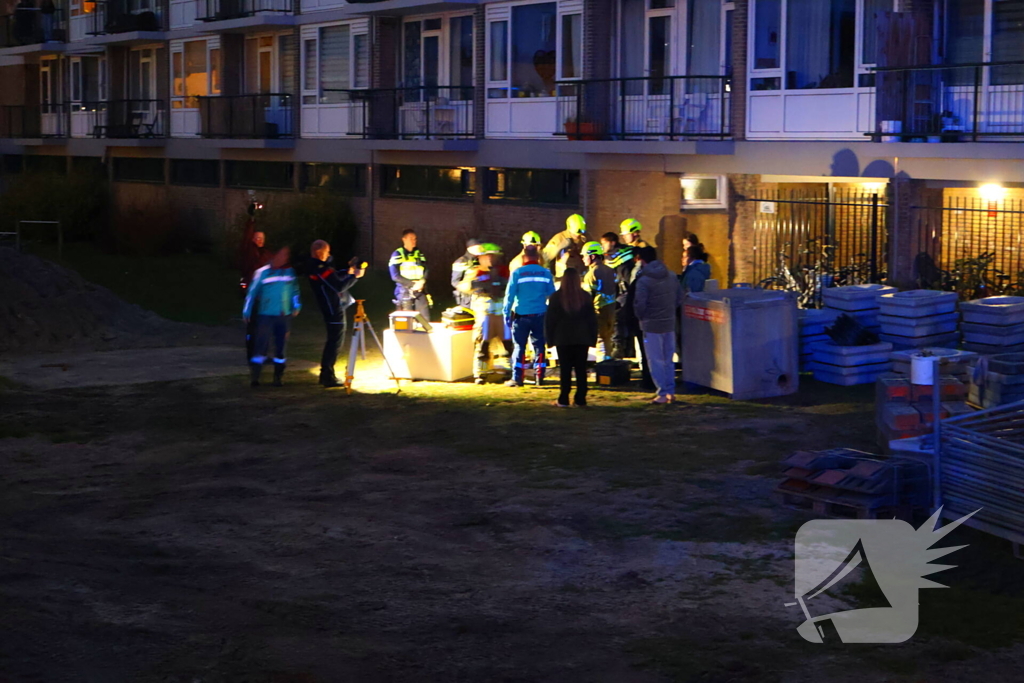 Kind bekneld onder pallet stenen