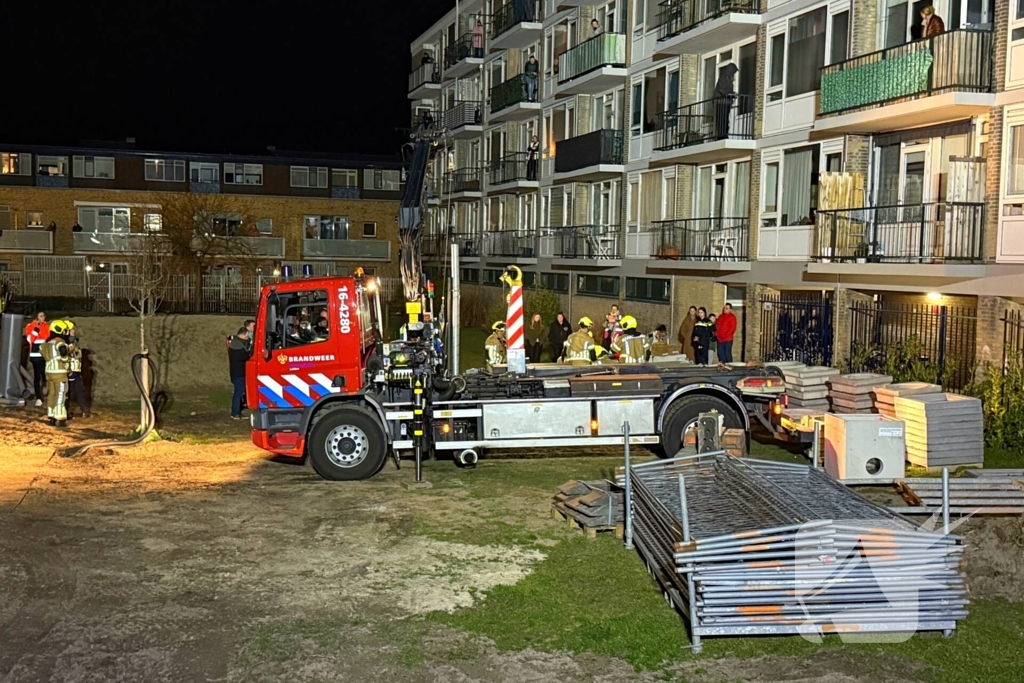 Kind bekneld onder pallet stenen