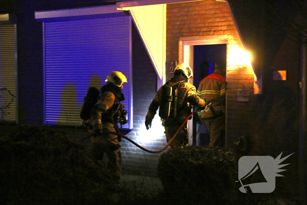 Bewoners gecontroleerd na brand in achtertuin