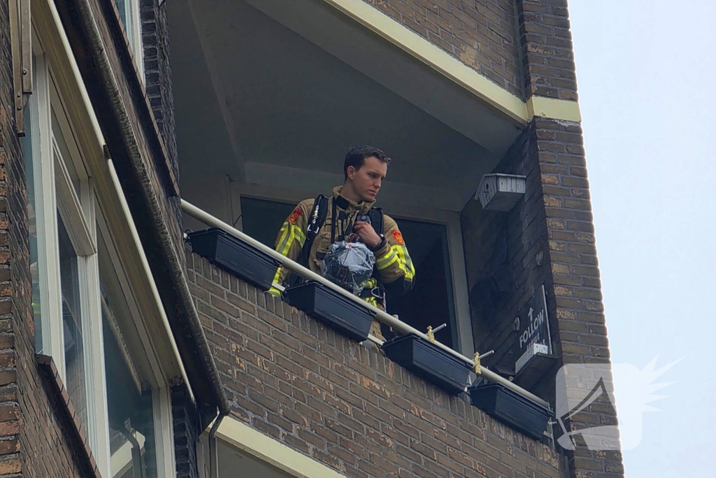 Brandweer in actie na alarm in flat