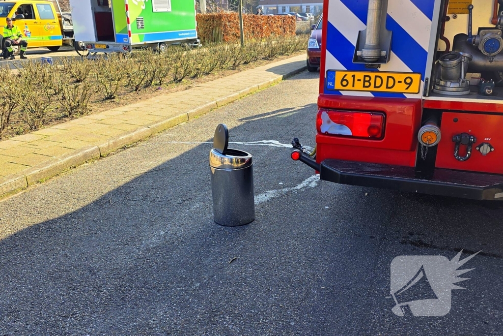 Melding van brand in portiekwoning