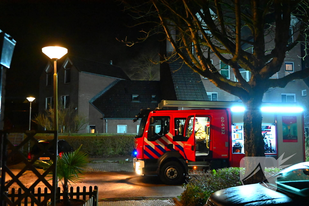Persoon gered uit brandende woning
