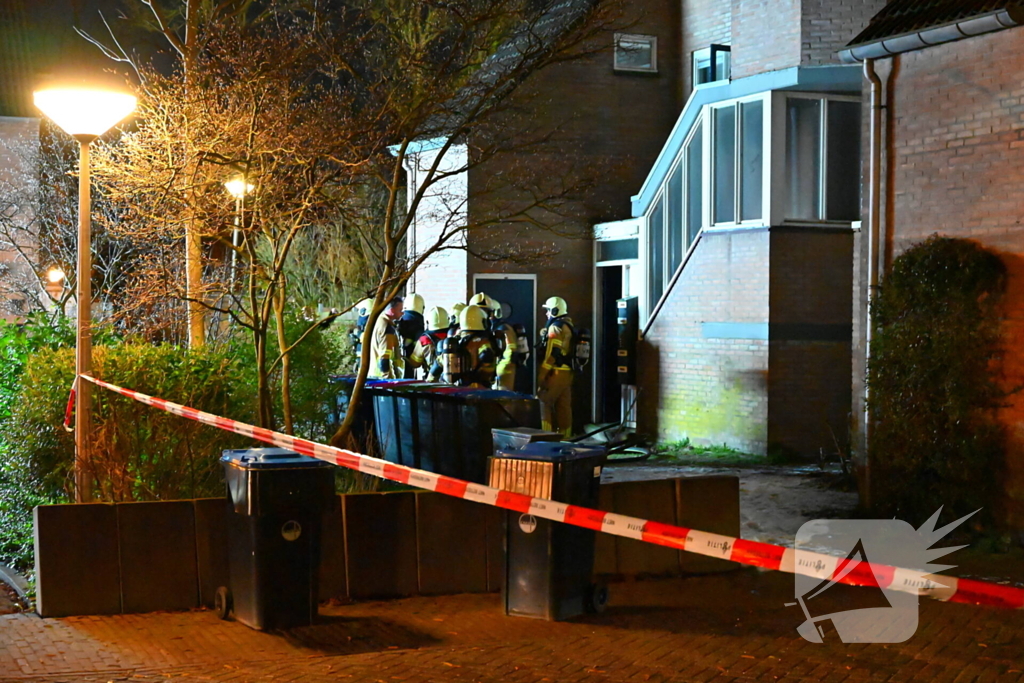 Persoon gered uit brandende woning
