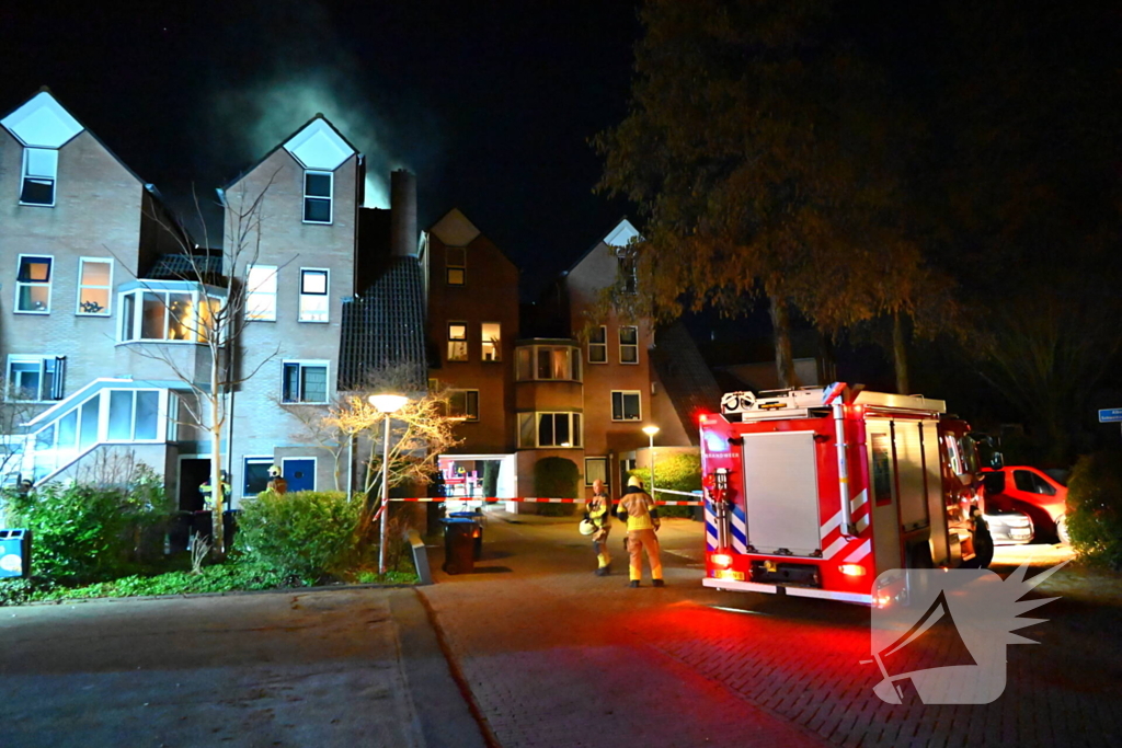 Persoon gered uit brandende woning