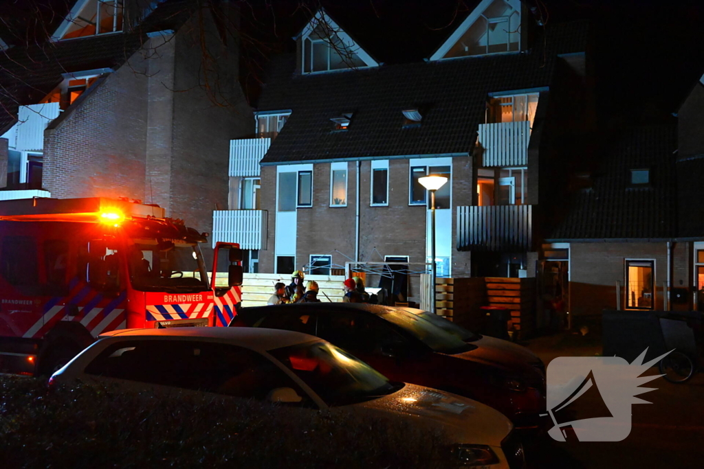 Persoon gered uit brandende woning