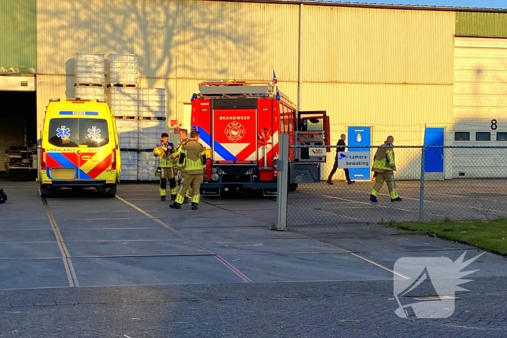 Persoon bekneld in bedrijfspand