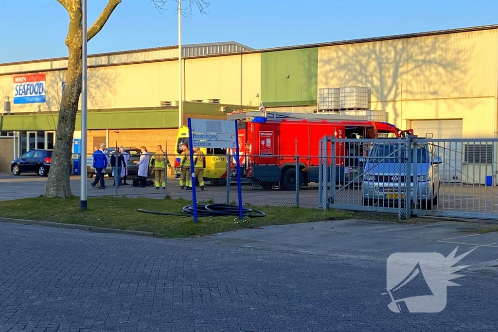 Persoon bekneld in bedrijfspand