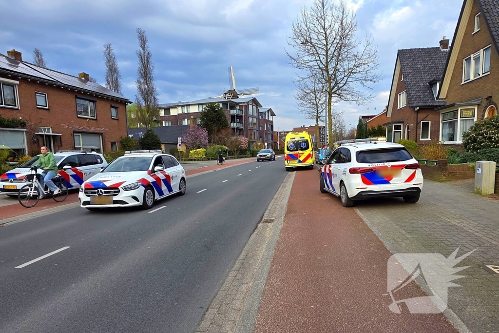 Fietser botst tegen openstaand portier