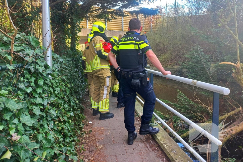 Brandweer blust buitenbrand