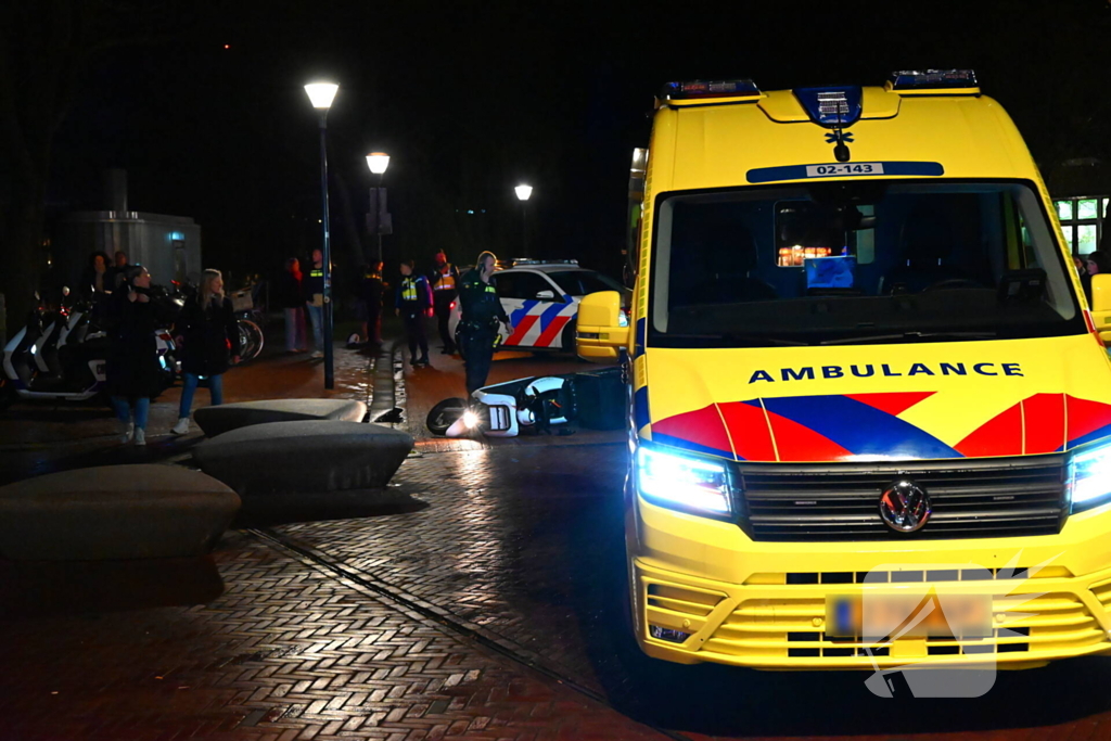 Bezorgkoerier gewond bij valpartij