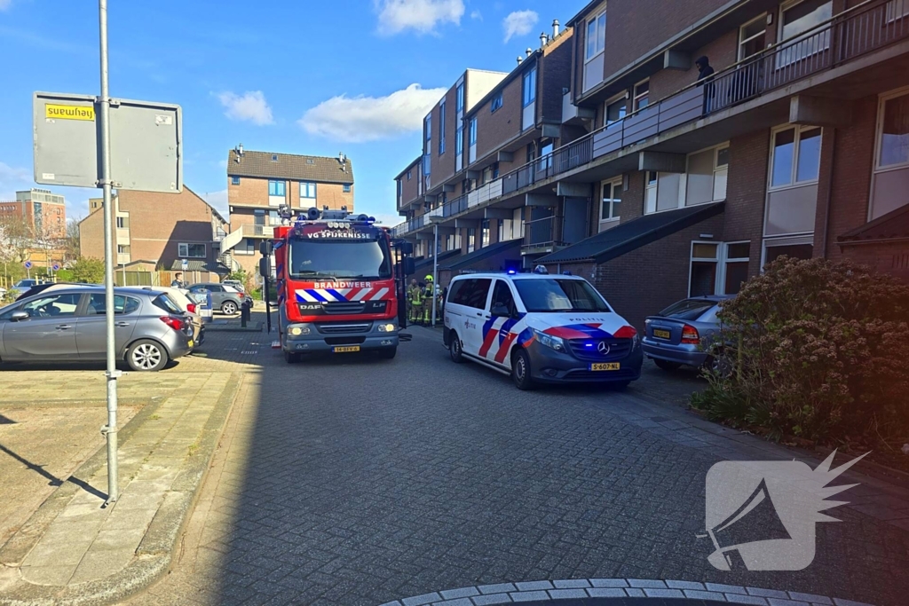 Brand in portiekflat snel onder controle