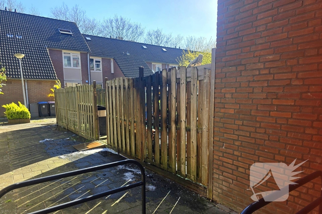 Brand in portiekflat snel onder controle