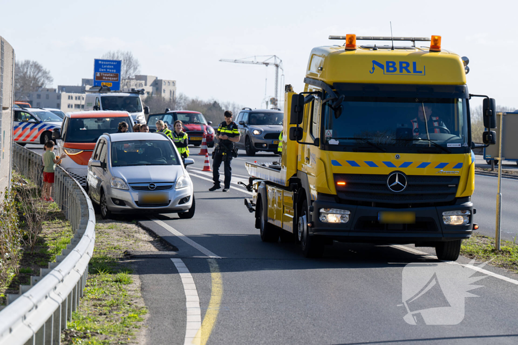 Schade en vertraging na kop-staartbotsing