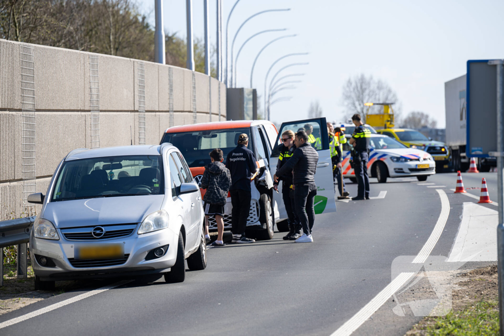 Schade en vertraging na kop-staartbotsing