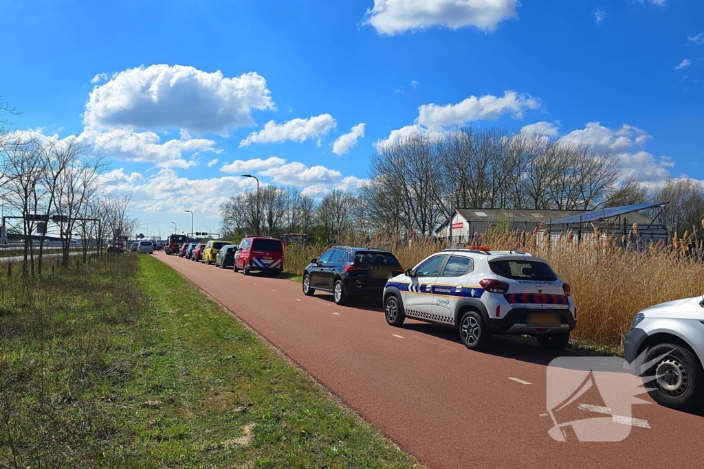 Afgebrokkelde kant van Valkenburgsemeer bedreigt gas en elektra leding