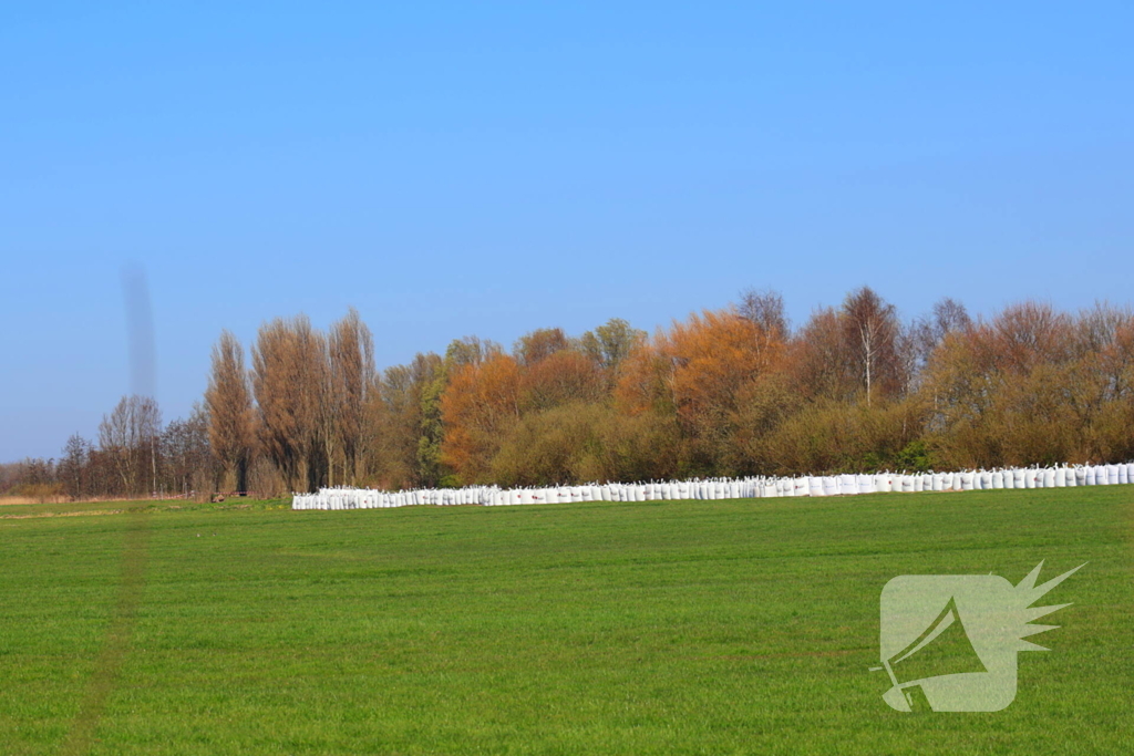 Zandzakken geplaatst ter voorkoming van overstroming