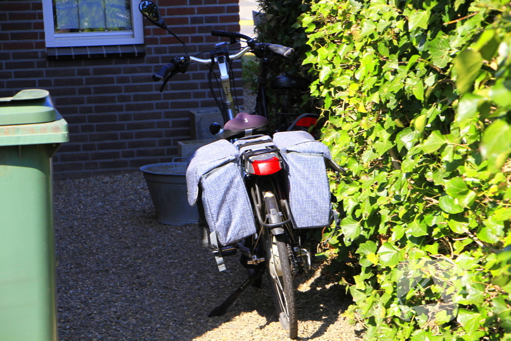 Motorrijder en fietser met elkaar in botsing