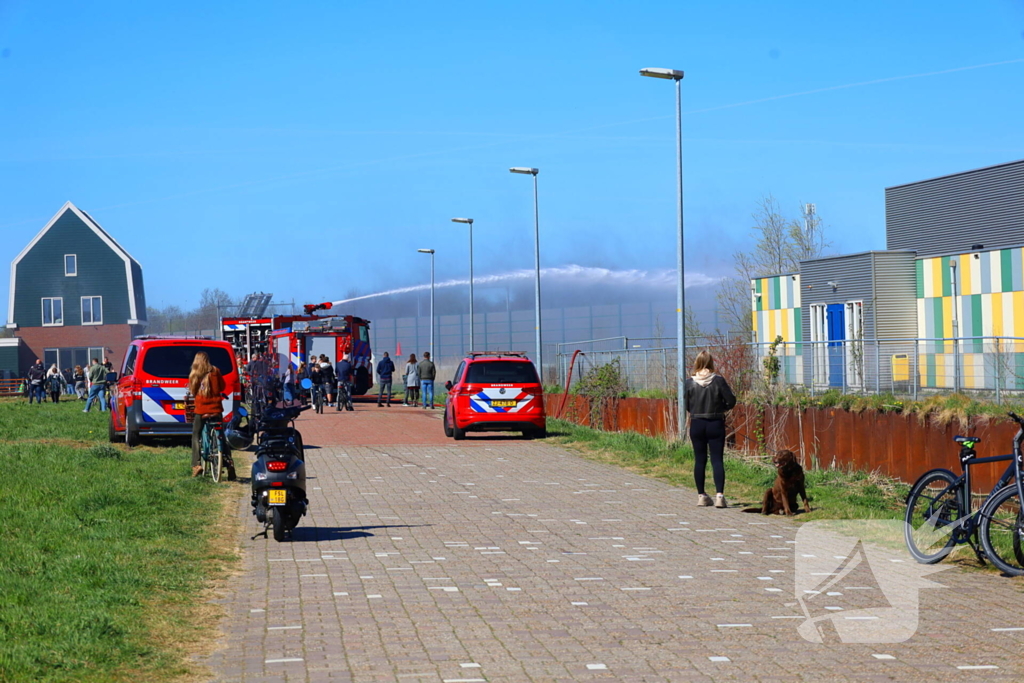 Brand in riet geblust door brandweer