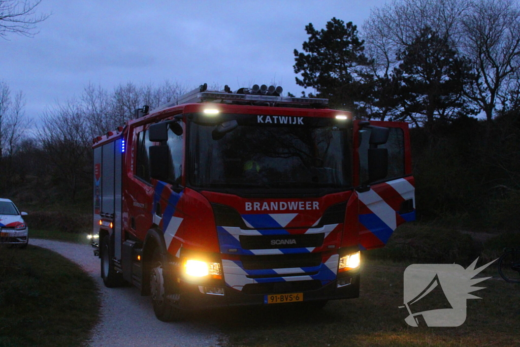 Brandweer blust brandende bosschage
