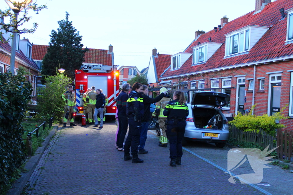 Binnenkant auto zwart door brand