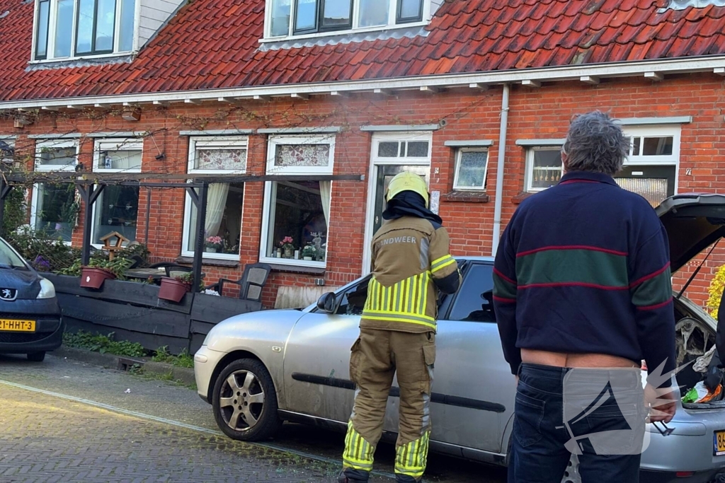 Binnenkant auto zwart door brand