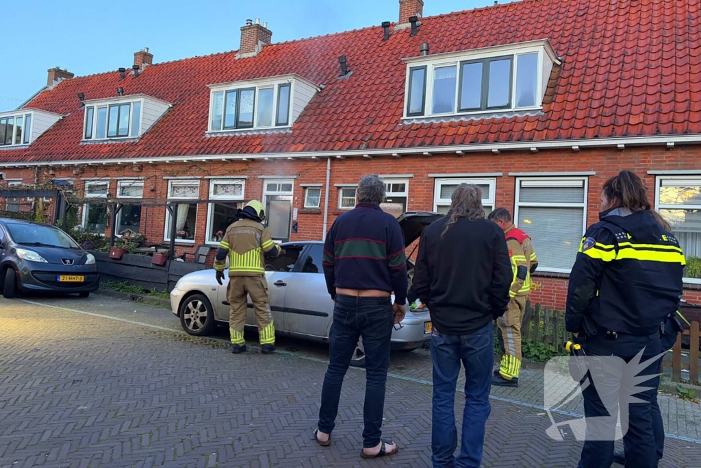 Binnenkant auto zwart door brand