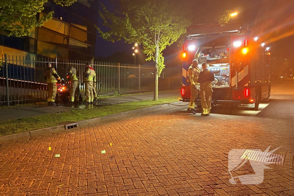 Brand in koffer van scooter