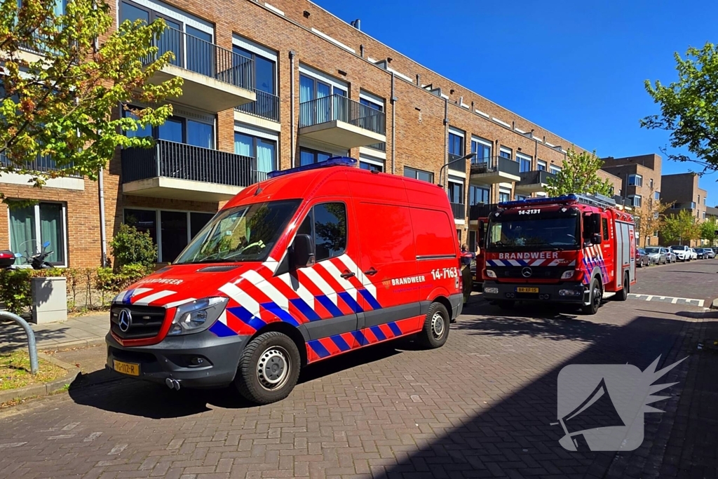 Palletkachel veroorzaakt brandmelding in flatwoning