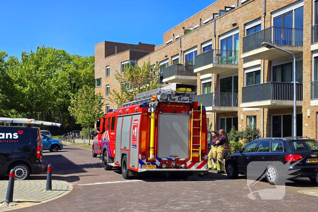 Palletkachel veroorzaakt brandmelding in flatwoning