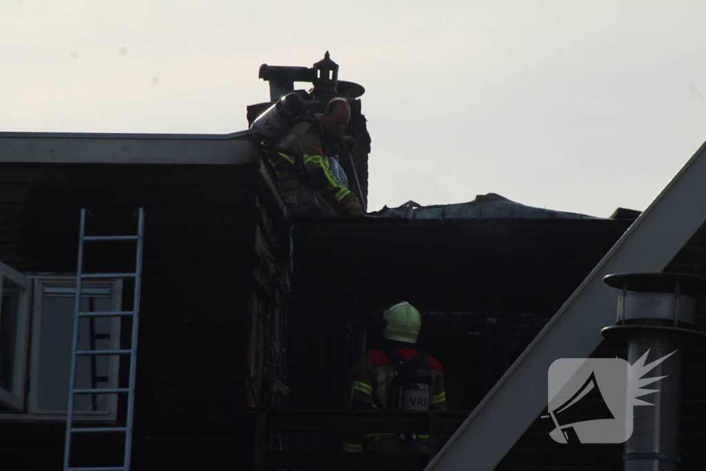 Veel rookontwikkeling bij brand in appartementen boven winkels