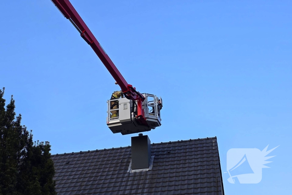 Vogel vast in schoorsteen