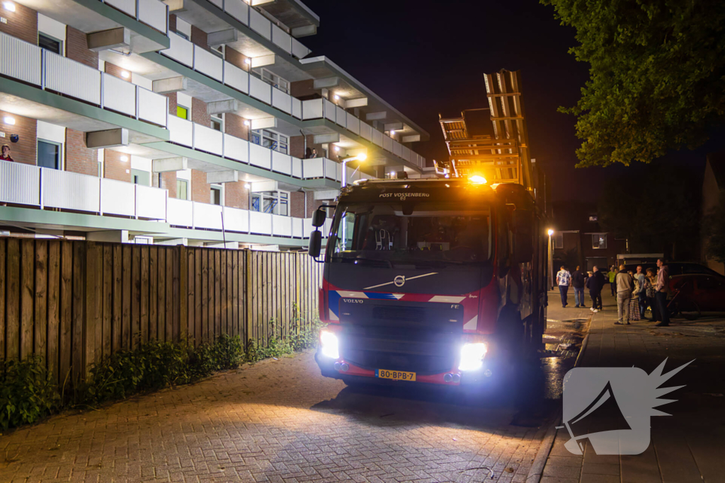 Scooter in brand gestoken achter flat