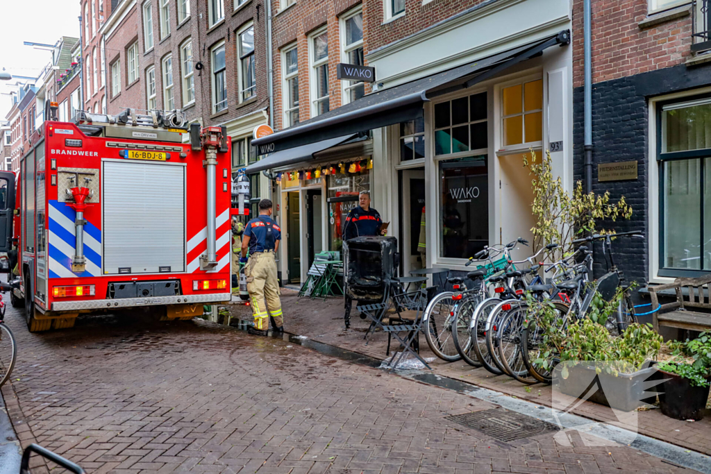 Brand in restaurant door grilloven