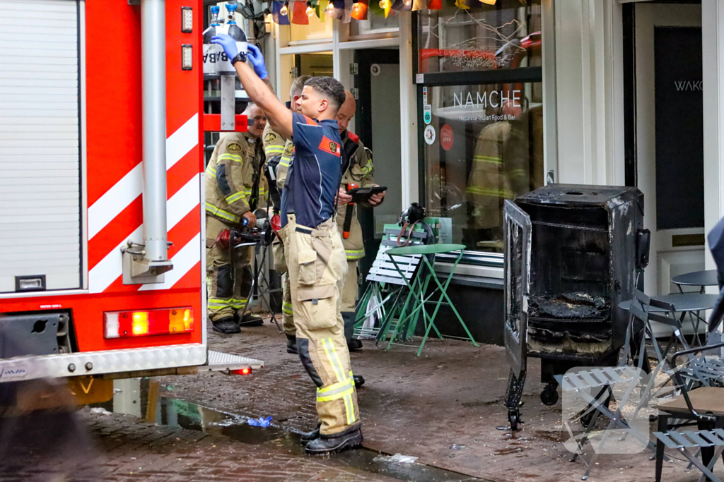 Brand in restaurant door grilloven
