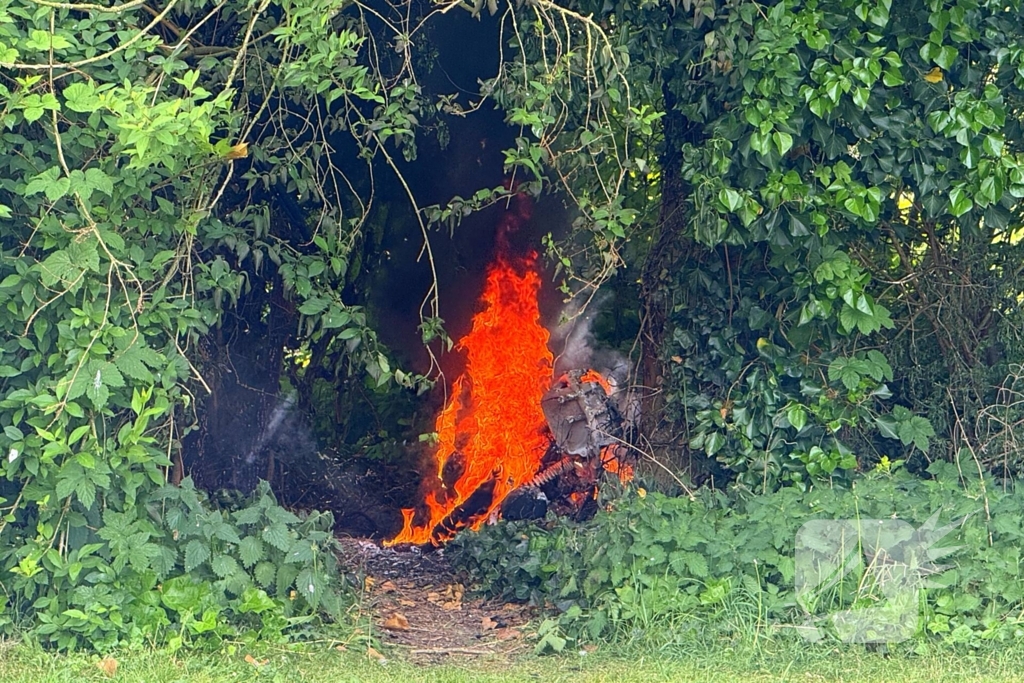 Scooter in brand gestoken