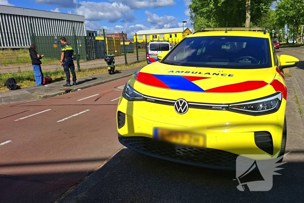 Verkeersongeluk tussen fietser en scooterrijder