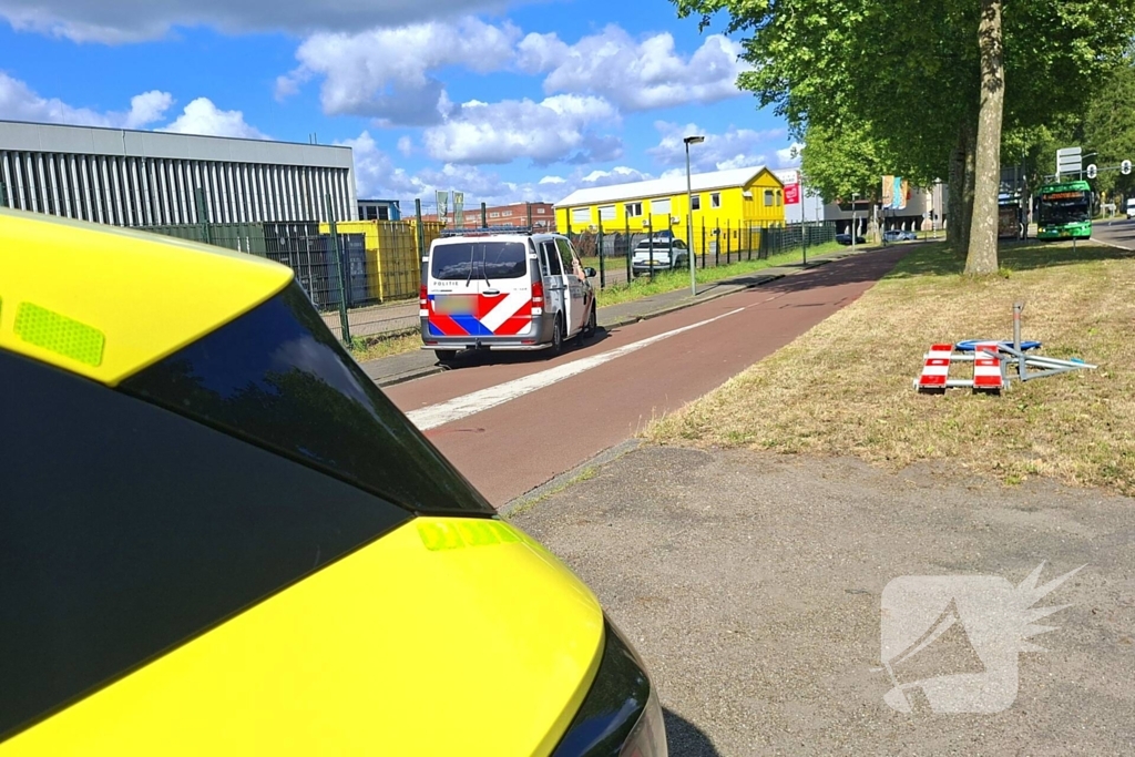 Verkeersongeluk tussen fietser en scooterrijder