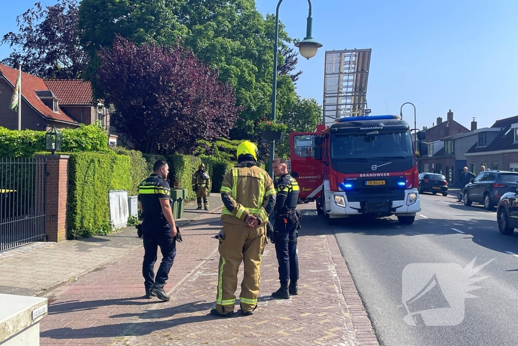 Brandweer ingezet voor brand achter een woning