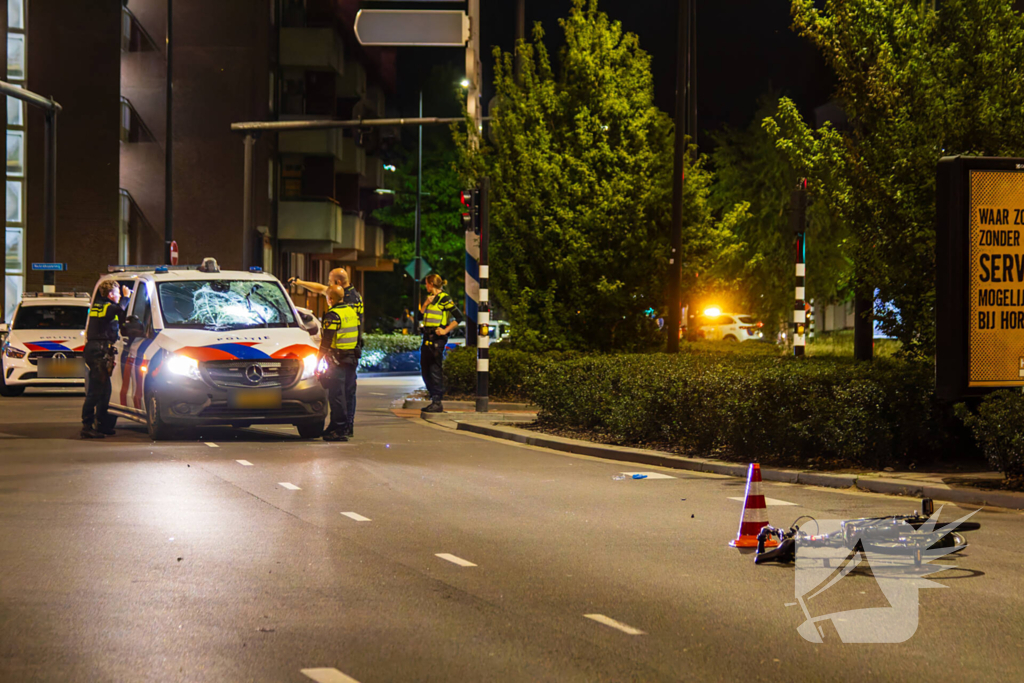 Politie schept fietser tijdens spoedrit