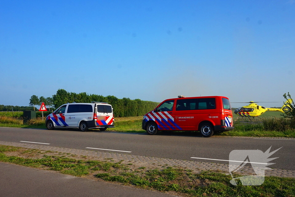 Ongeval met crossmotor in weiland