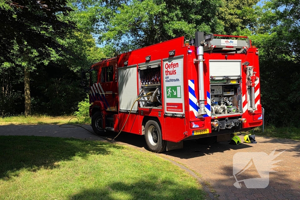 Brand in bosschage snel onder controle