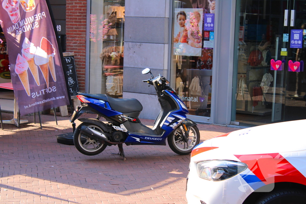Botsing tussen fiets en scooter