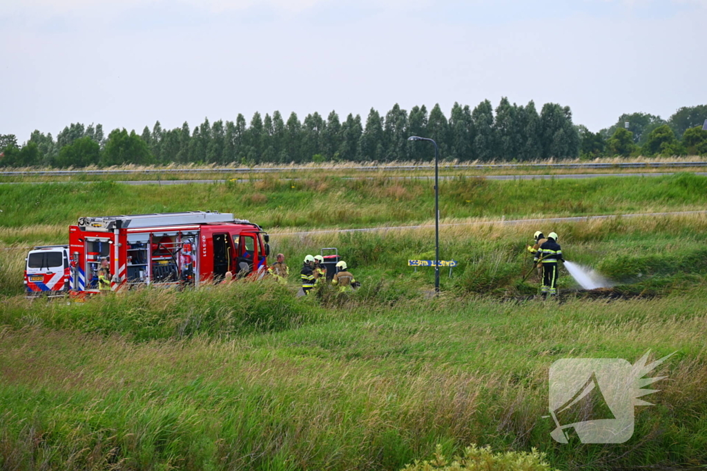 Bermbrand op carpoolplaats snel onder controle