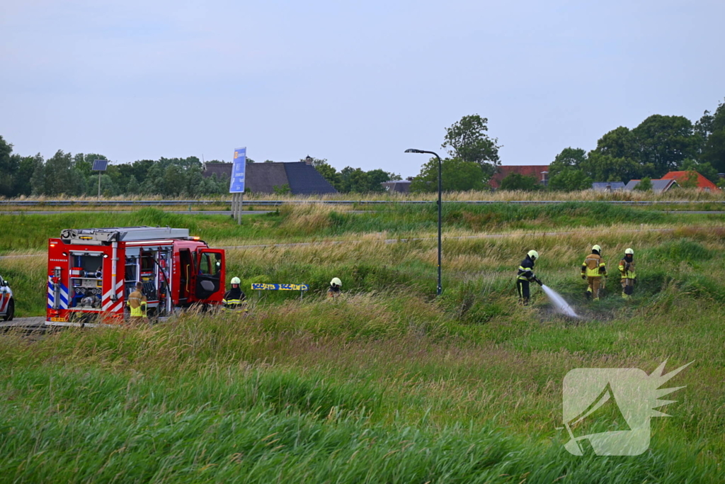 Bermbrand op carpoolplaats snel onder controle