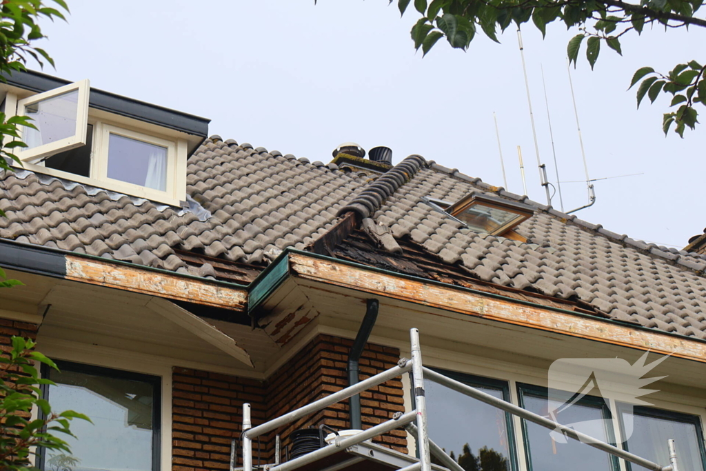 Sloopwerkzaamheden bij brand in dak