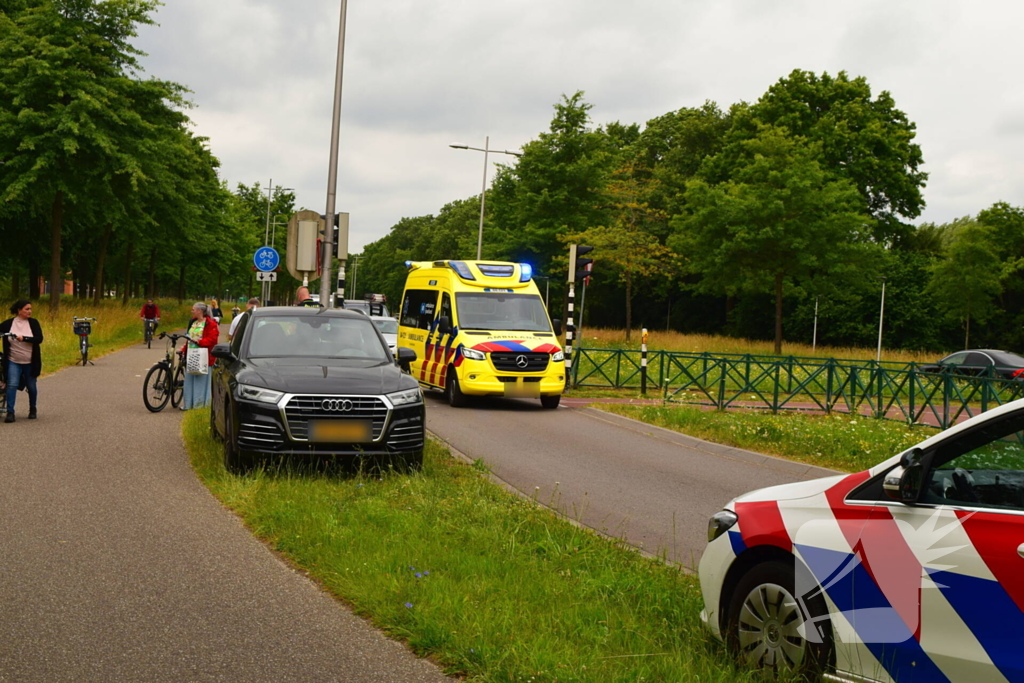 Botsing driewielfiets en auto