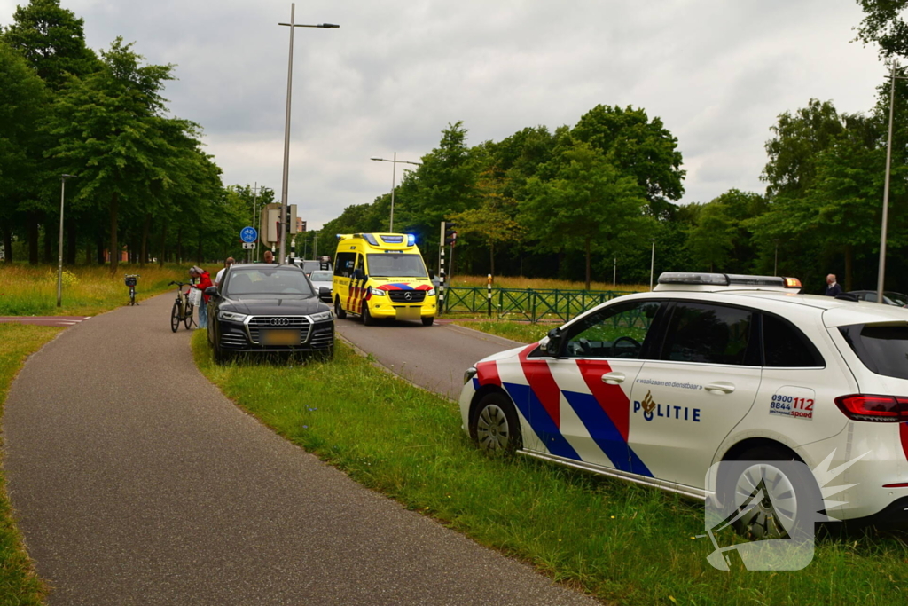 Botsing driewielfiets en auto